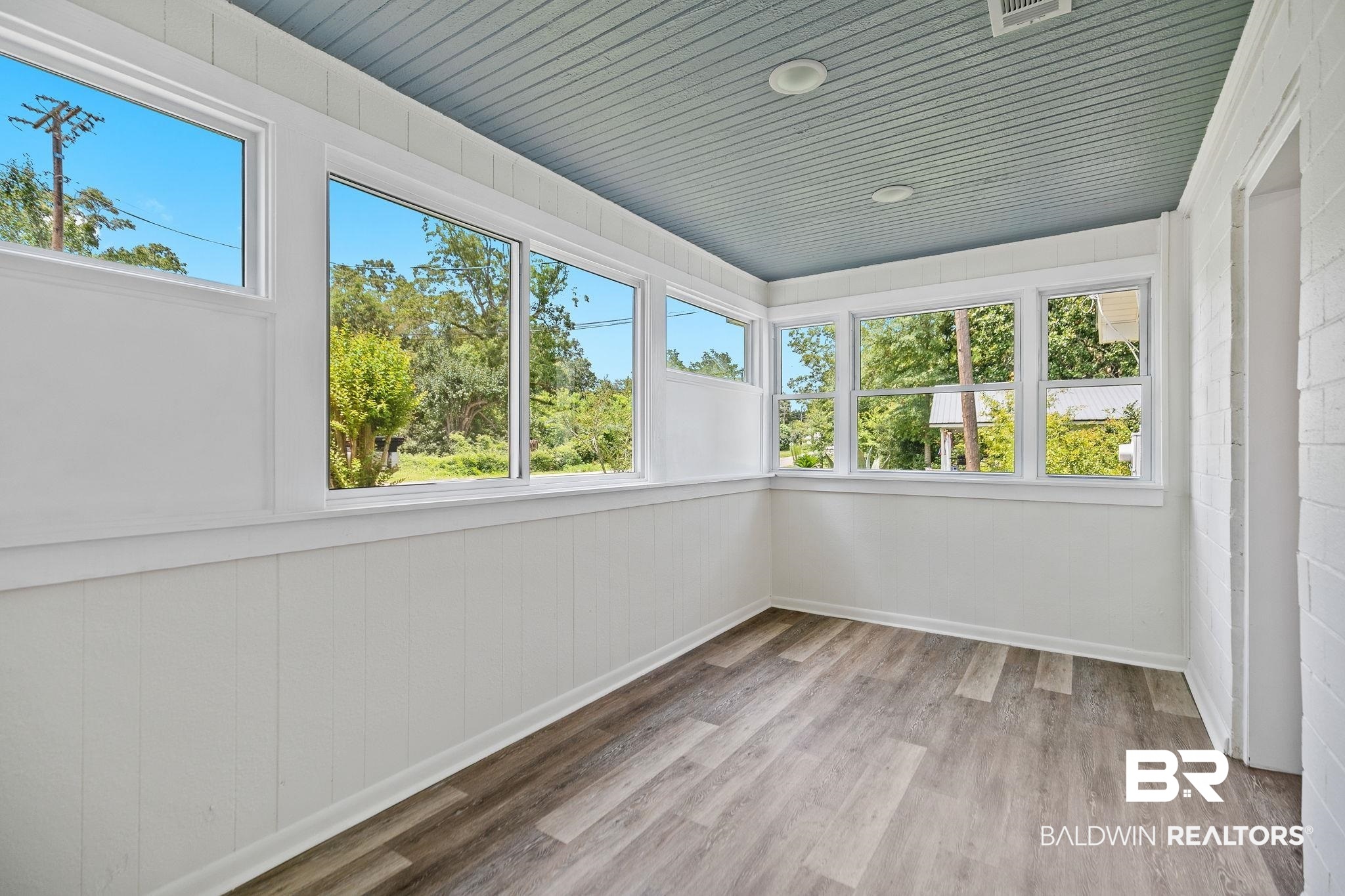 507 Byrne Street Bay Minette, AL 36507 - Photo 28 of 40 Unfurnished sunroom featuring wood ceiling