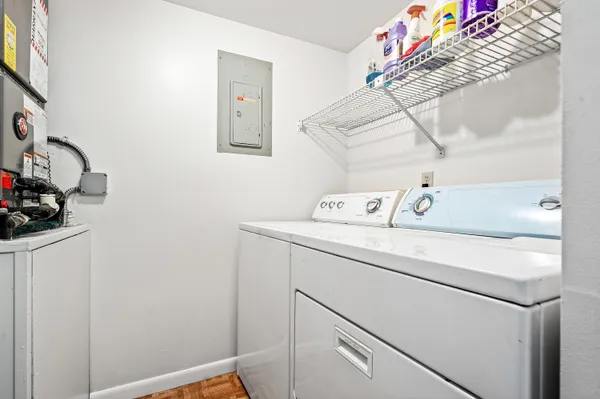 a utility room with dryer and washer