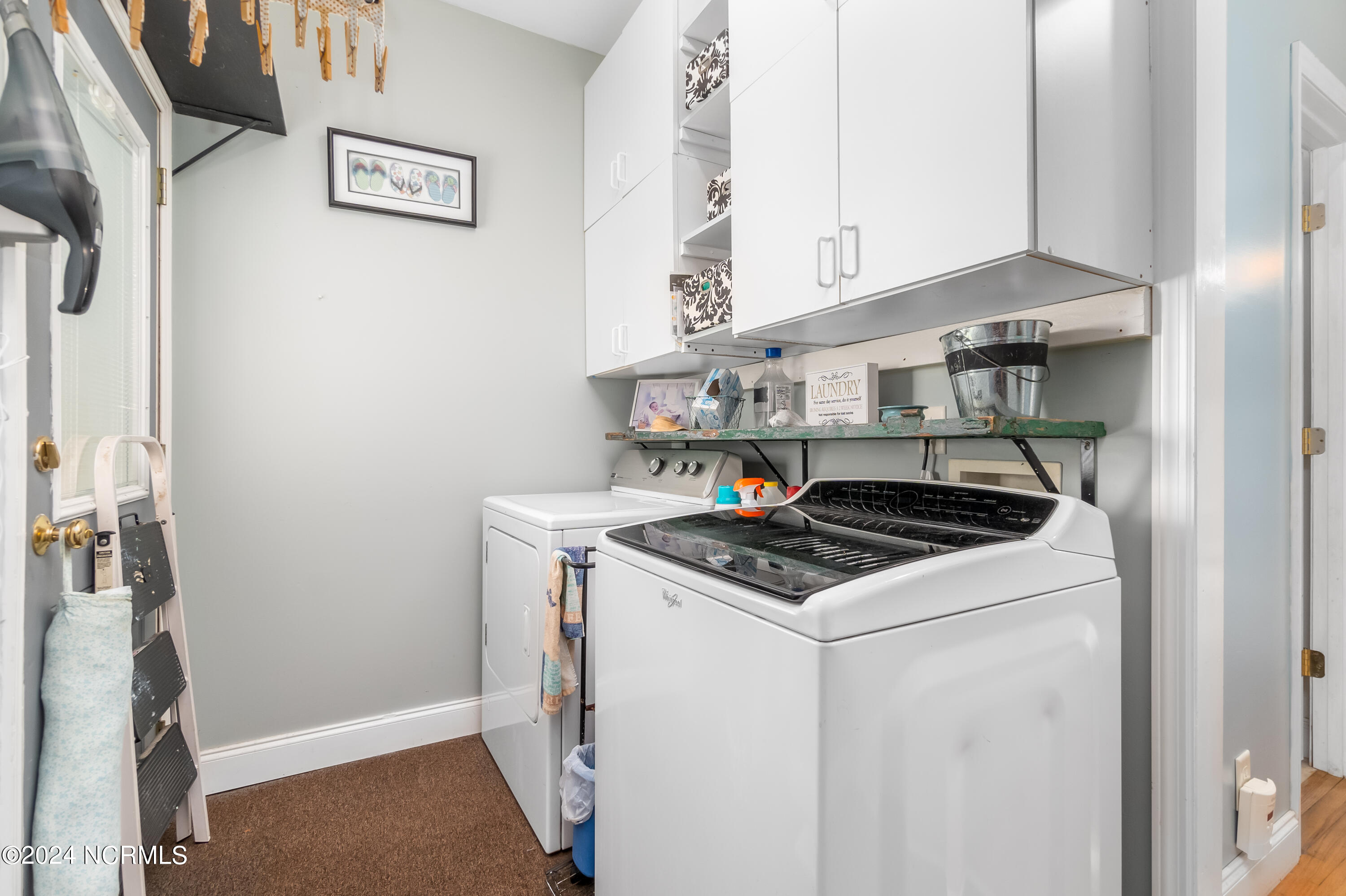 170 Narrow Shore Road Aydlett, NC 27916 - Photo 29 of 48 First floor laundry next to kitchen w/pantry