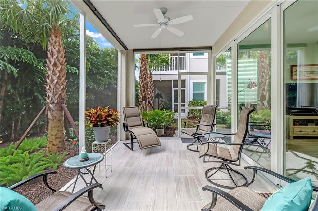 6959 Avalon Circle, Unit 1704 Naples, FL 34112 - Photo 22 of 25 a view of a dining room with furniture window and outside view