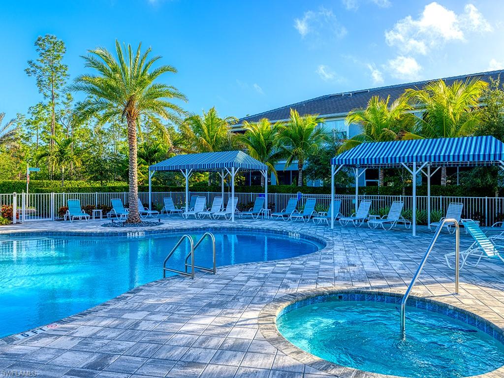6959 Avalon Circle, Unit 1704 Naples, FL 34112 - Photo 25 of 25 a view of a swimming pool with a patio