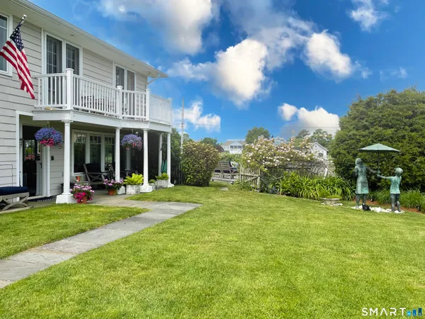 a view of lake with a yard