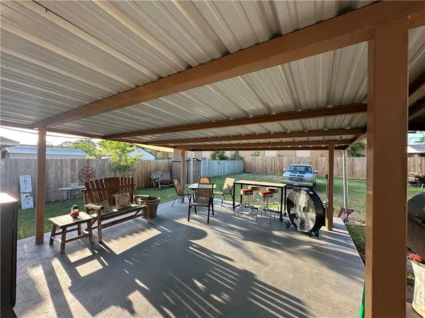 a view of outdoor space with seating area