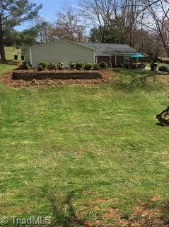 113 Locust Road King, NC 27021 - Photo 5 of 21 Rear View