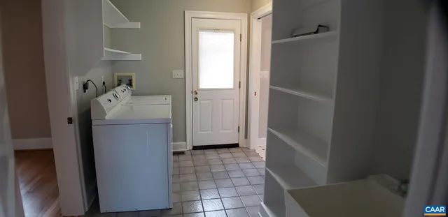 a bathroom with a shower and a toilet