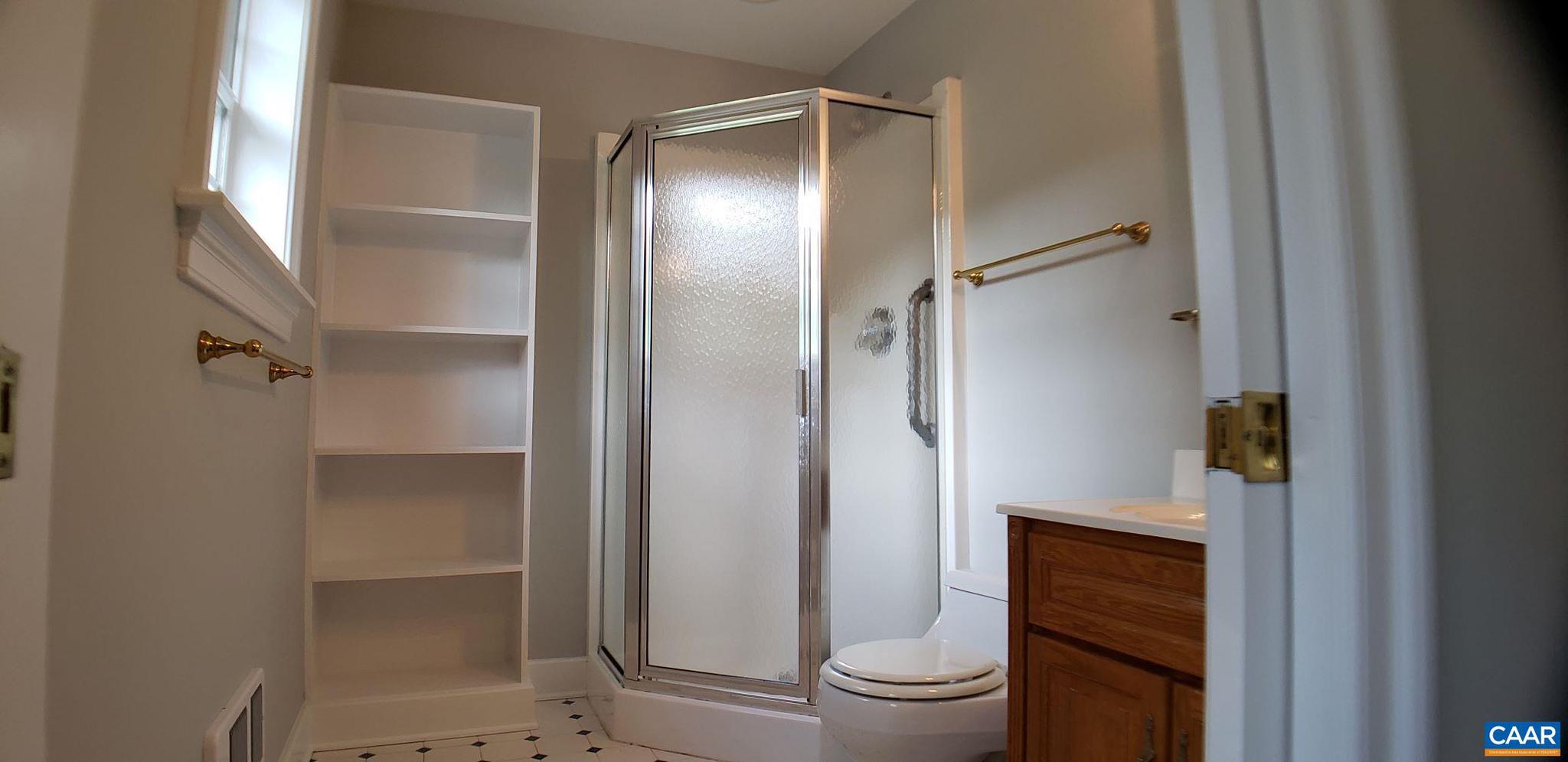 1874 White Hall Road Crozet, VA 22932 - Photo 24 of 39 a bathroom with a shower and a toilet