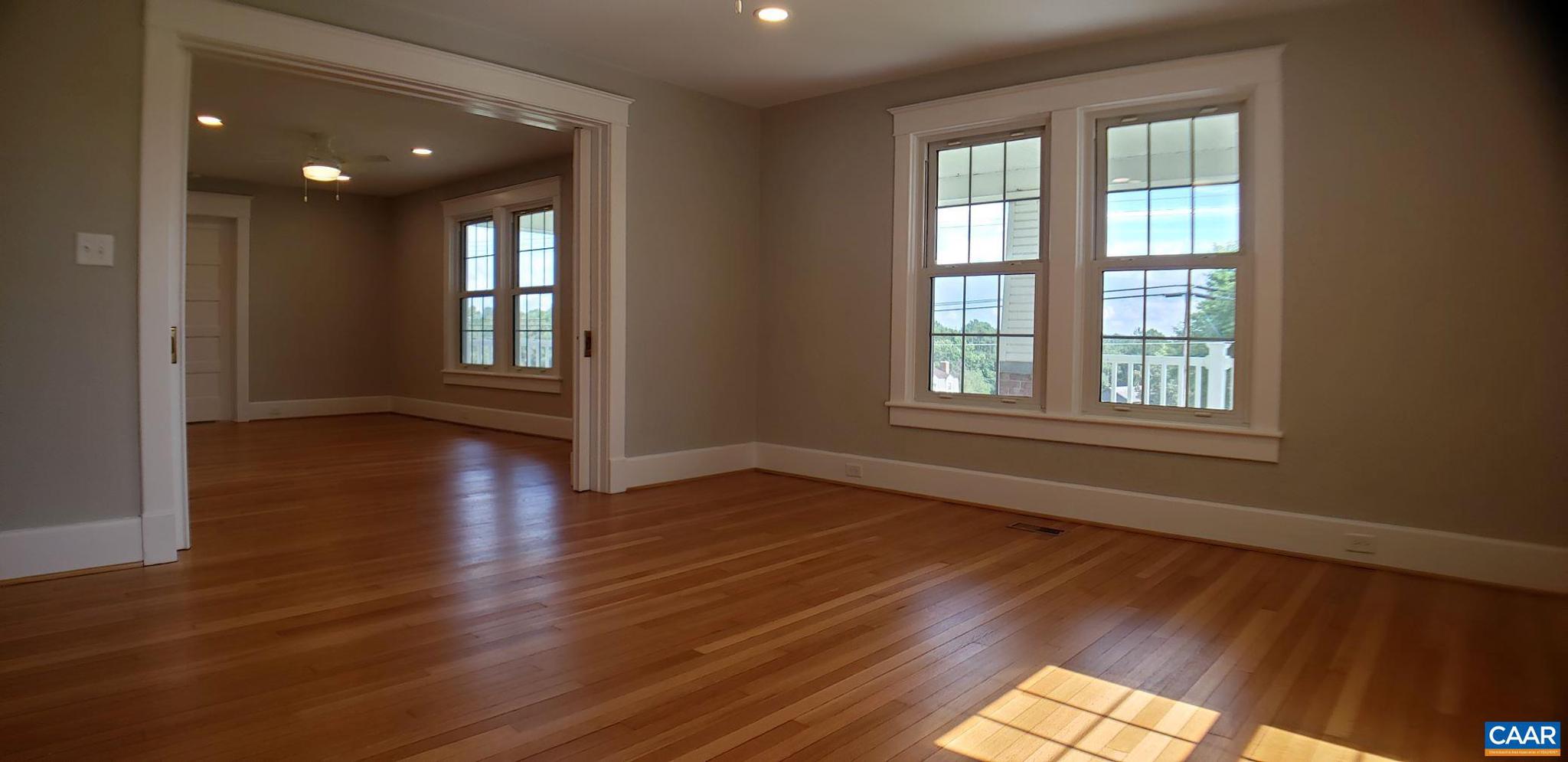 1874 White Hall Road Crozet, VA 22932 - Photo 8 of 39 a view of an empty room with wooden floor and a window