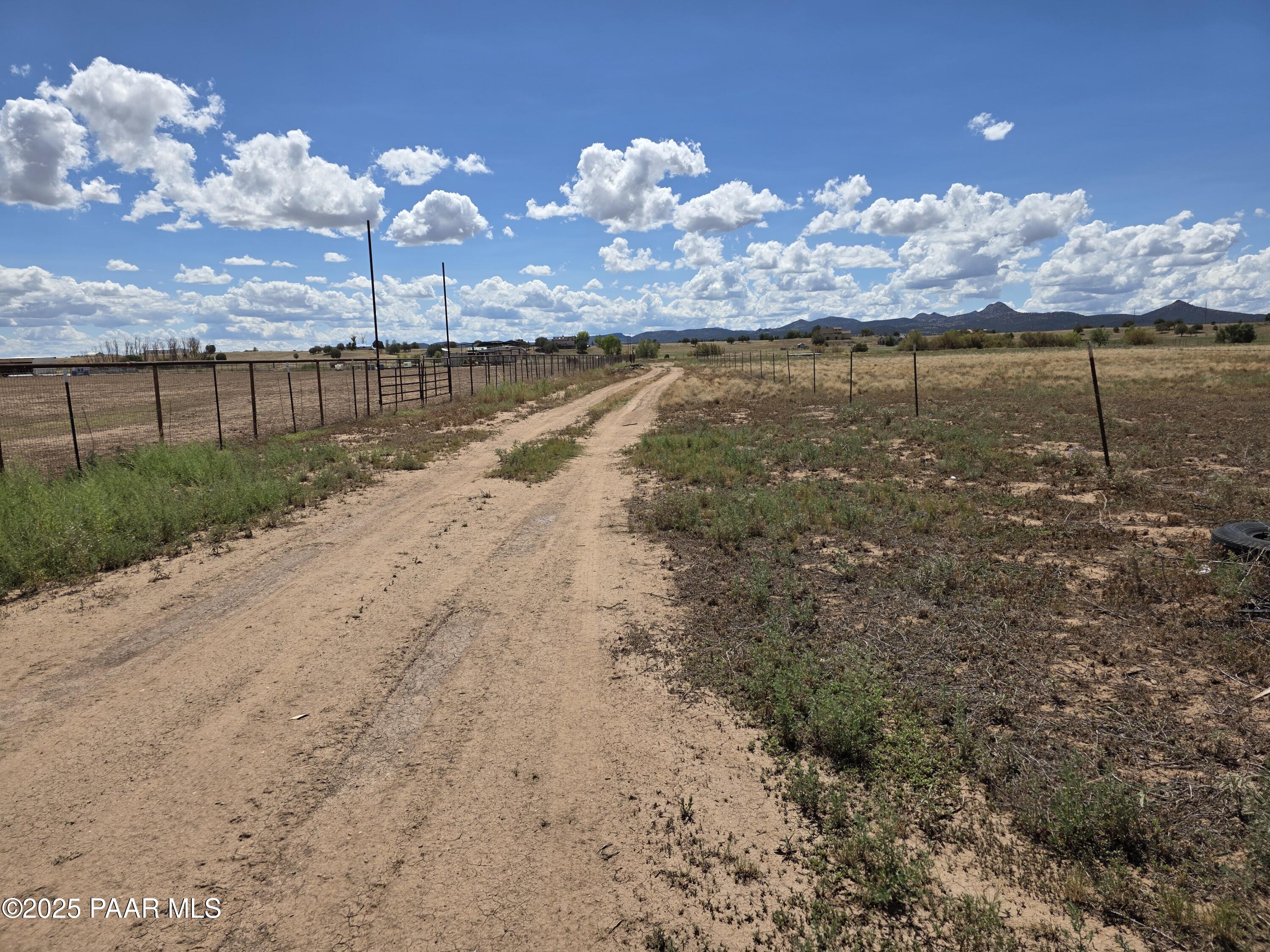 25650 North Trinity Rnch Road Paulden, AZ 86334 - Photo 3 of 5 a view of a lake with a big yard