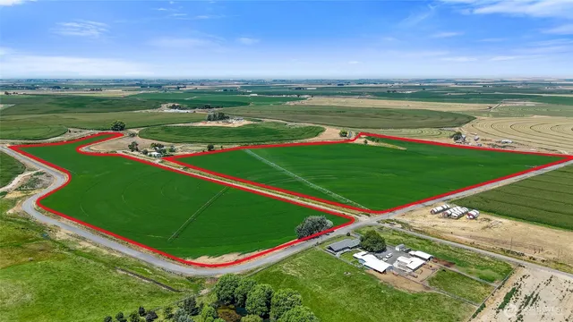 a view of a field with clear sky