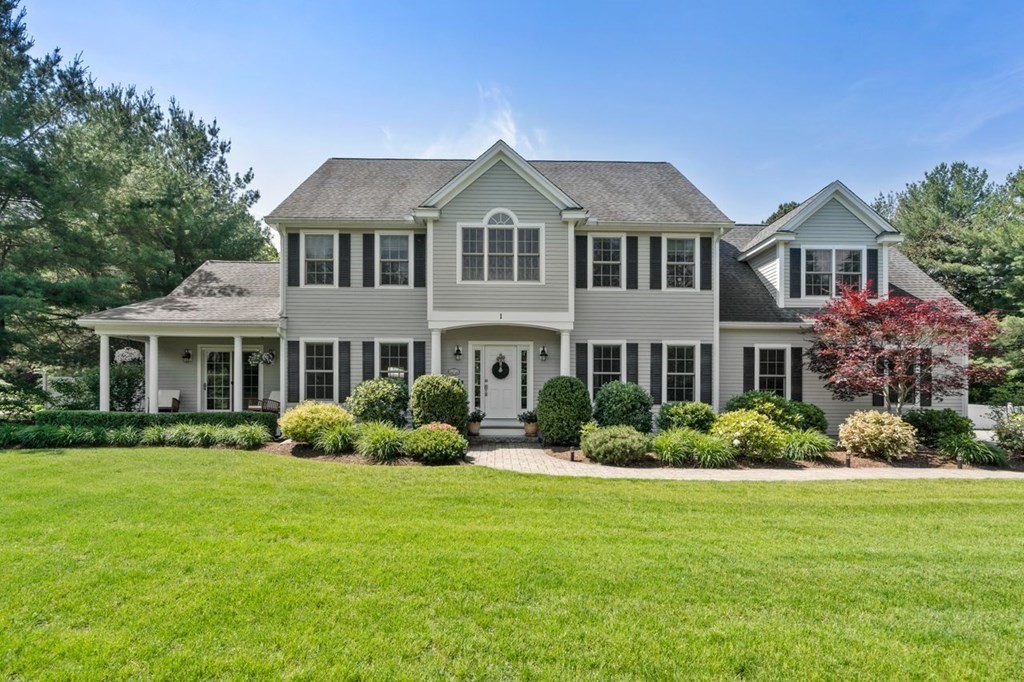 1 Hawes Road Sudbury, MA 01776 - Photo 1 of 38 a front view of a house with a yard