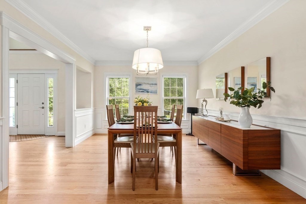 1 Hawes Road Sudbury, MA 01776 - Photo 15 of 38 a view of a dining room with furniture window and wooden floor