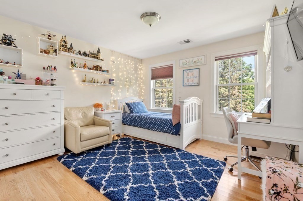 1 Hawes Road Sudbury, MA 01776 - Photo 22 of 38 a living room with furniture and a window