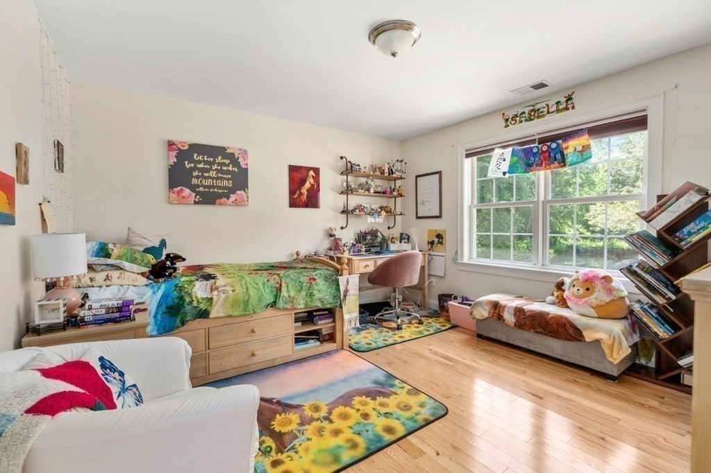 1 Hawes Road Sudbury, MA 01776 - Photo 24 of 38 a bedroom with furniture and a large window
