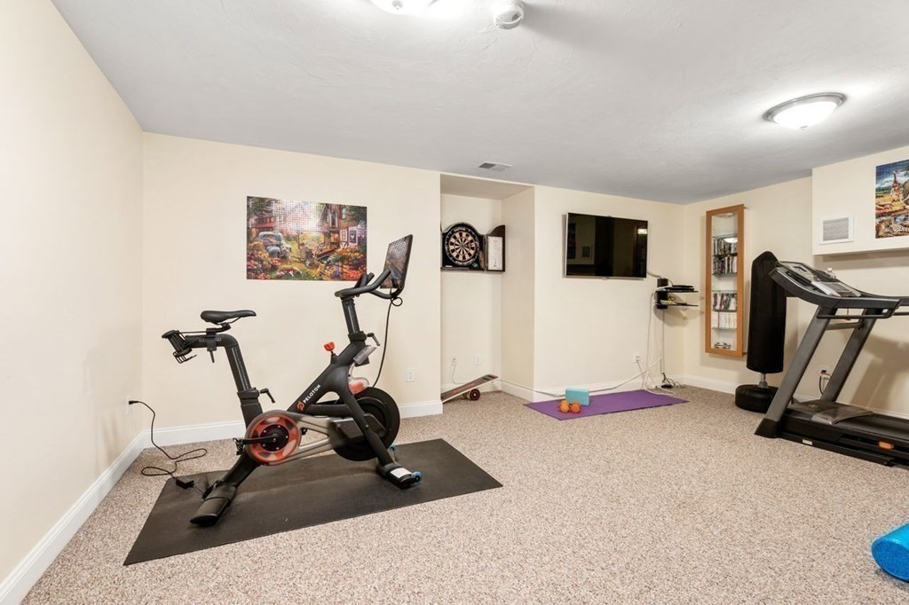 1 Hawes Road Sudbury, MA 01776 - Photo 30 of 38 a view of a room with gym equipment