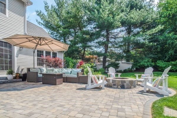 1 Hawes Road Sudbury, MA 01776 - Photo 32 of 38 a view of a patio with chairs and plants