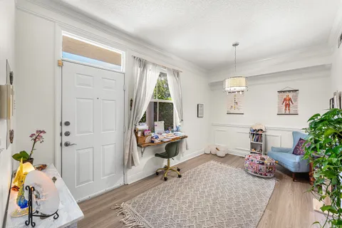 a kitchen with stainless steel appliances kitchen island granite countertop a refrigerator and stove top oven