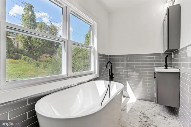 a view of a bathtub in a bathroom
