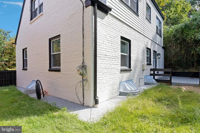 a backyard of a house with seating space