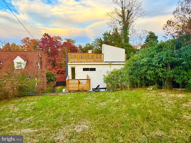 a view of balcony and yard