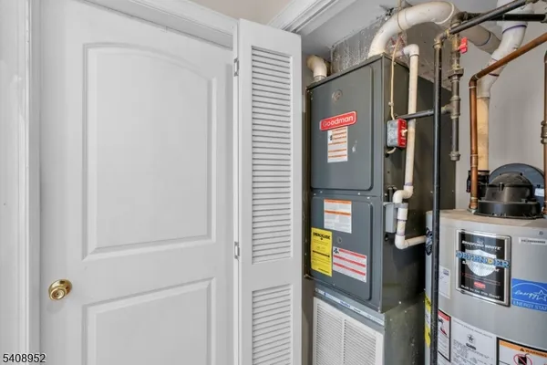 a view of a hallway with washer and dryer