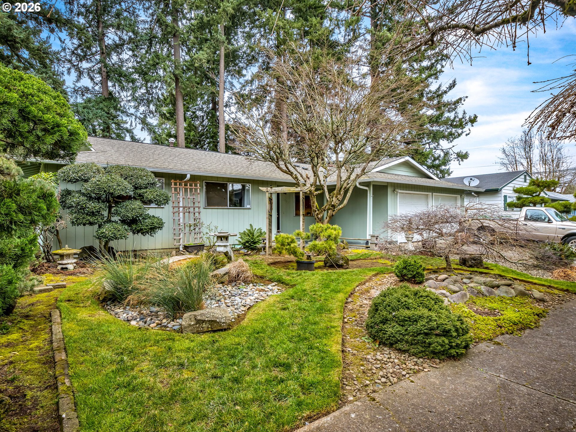 1033 Northeast 178th Avenue Portland, OR 97230 - Photo 1 of 29 a view of a house with backyard and sitting area