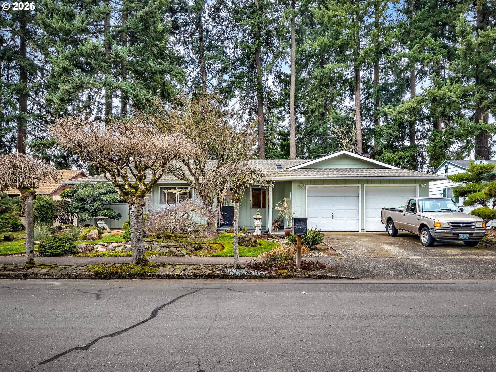 1033 Northeast 178th Avenue Portland, OR 97230 - Photo 2 of 29 a car parked in front of a building
