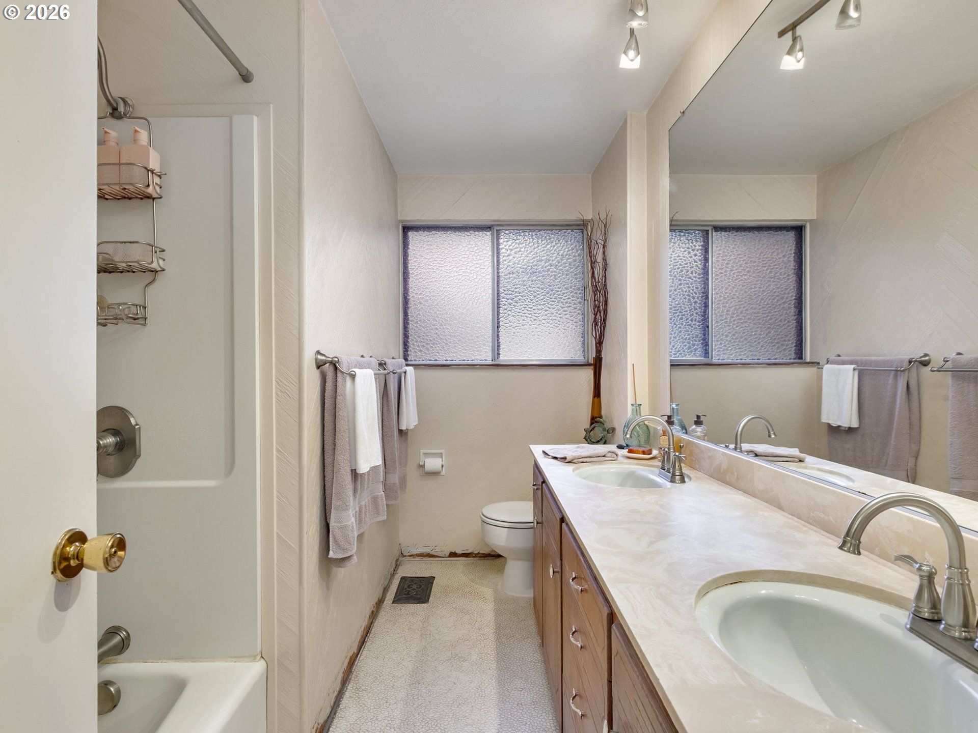 1033 Northeast 178th Avenue Portland, OR 97230 - Photo 21 of 29 a bathroom with a tub sink and mirror