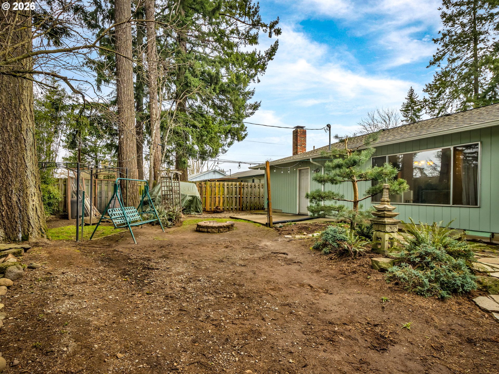 1033 Northeast 178th Avenue Portland, OR 97230 - Photo 27 of 29 a backyard of a house with table and chairs