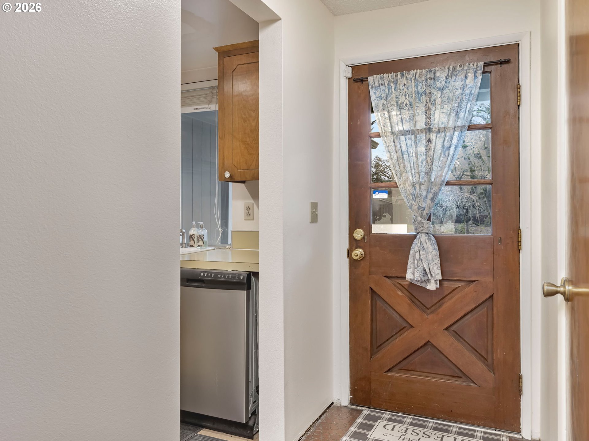 1033 Northeast 178th Avenue Portland, OR 97230 - Photo 5 of 29 a view of an entryway with wooden floor