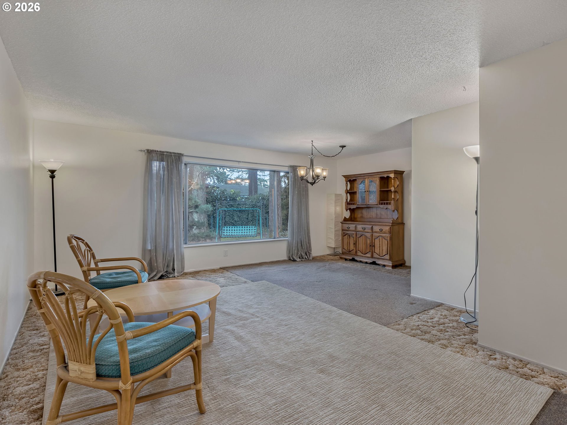 1033 Northeast 178th Avenue Portland, OR 97230 - Photo 6 of 29 a living room with furniture and a large window