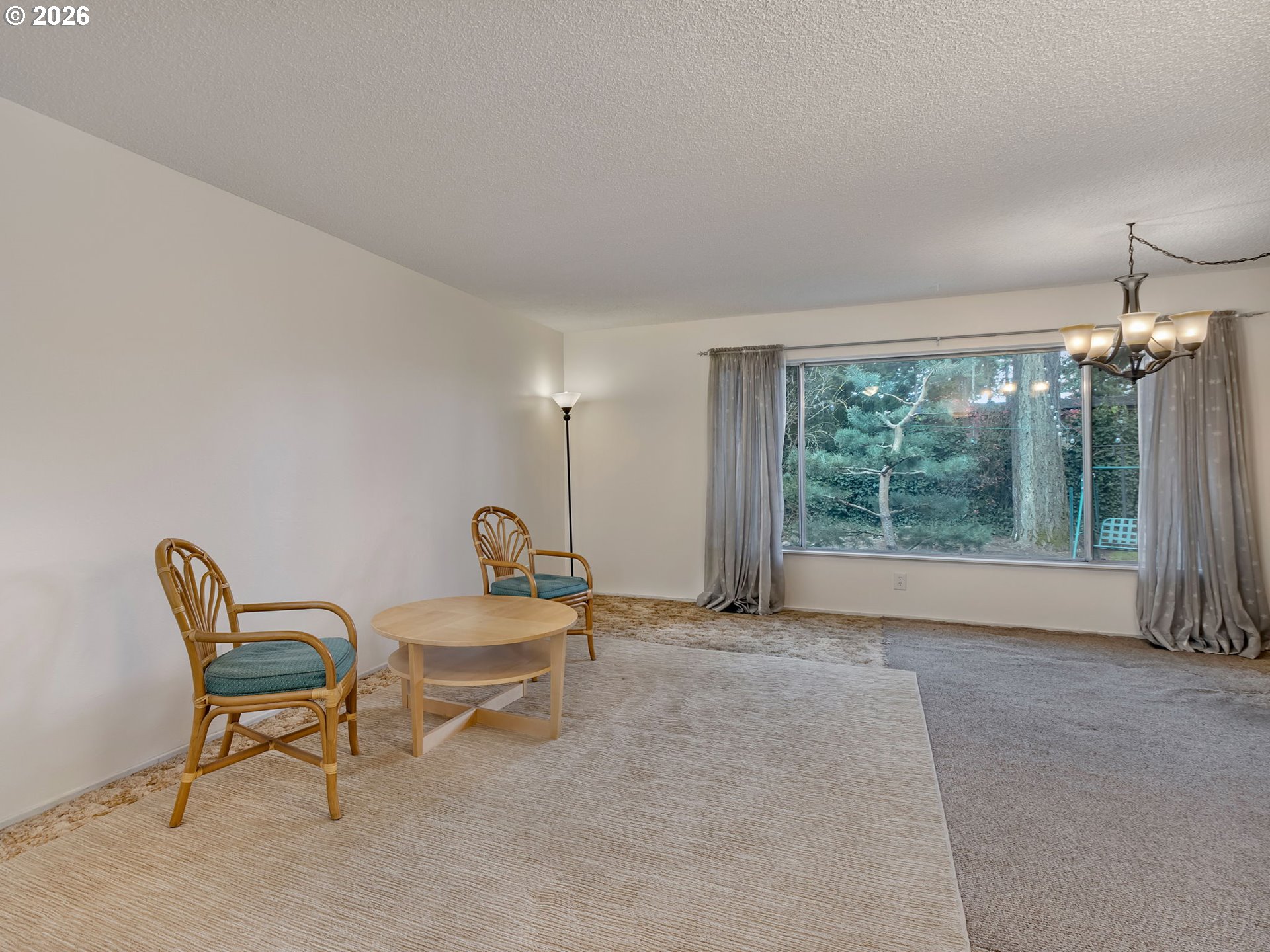 1033 Northeast 178th Avenue Portland, OR 97230 - Photo 7 of 29 a living room with furniture and a large window