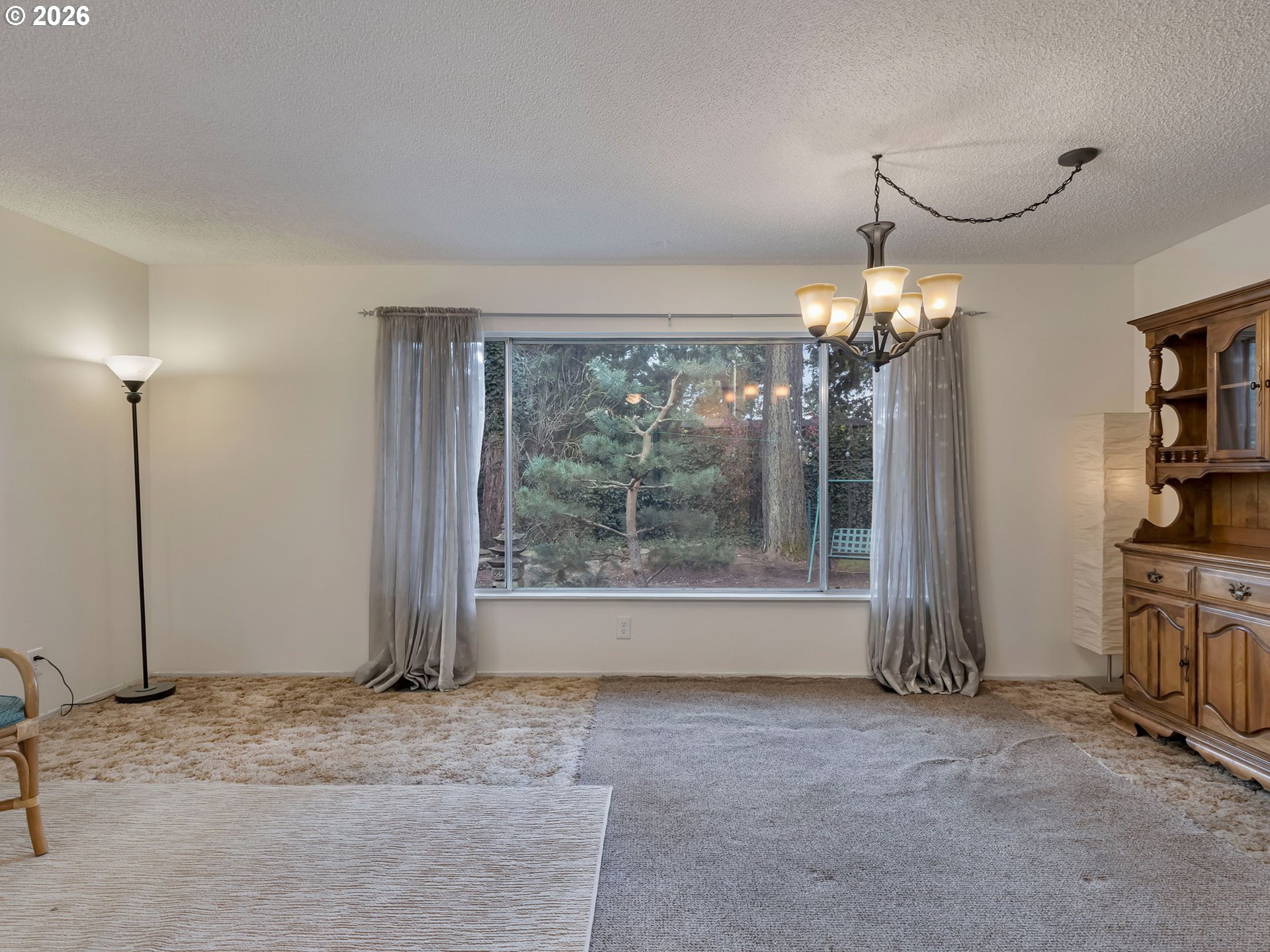 1033 Northeast 178th Avenue Portland, OR 97230 - Photo 8 of 29 a view of livingroom with furniture and chandelier fan