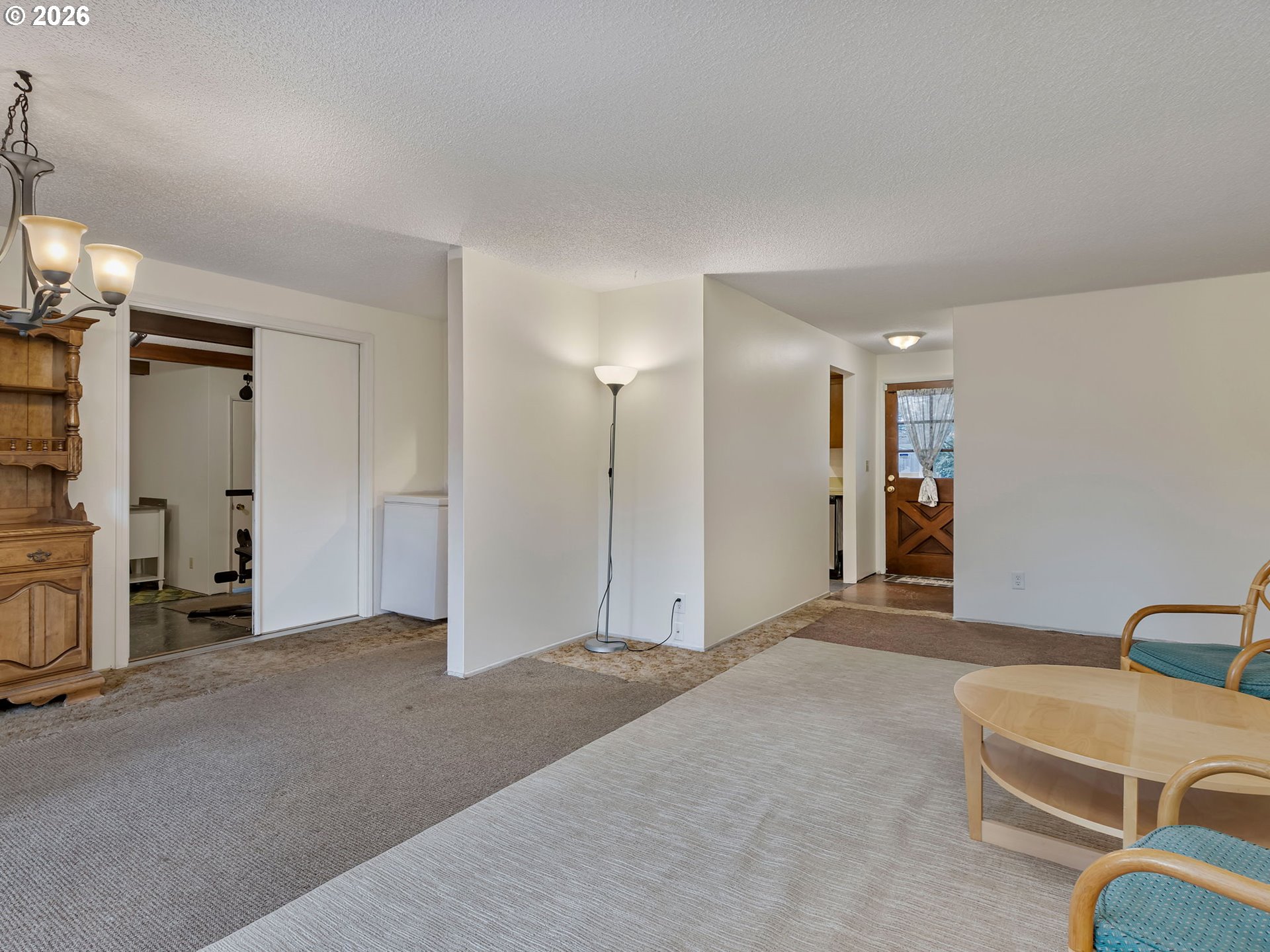 1033 Northeast 178th Avenue Portland, OR 97230 - Photo 10 of 29 a view of a livingroom with a furniture and a ceiling fan