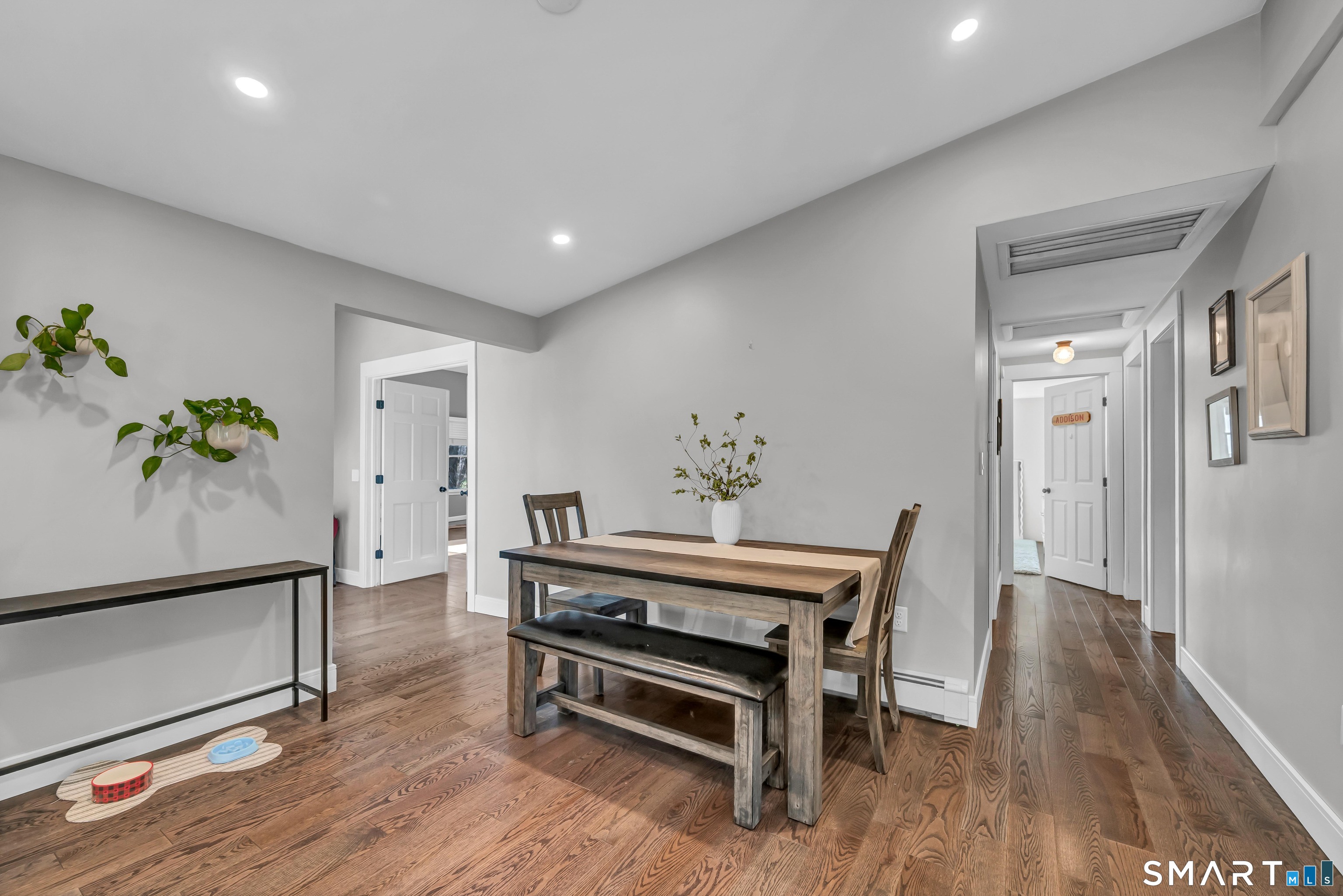 10 Grove Place Bethel, CT 06801 - Photo 13 of 33 a view of dining room with furniture and wooden floor