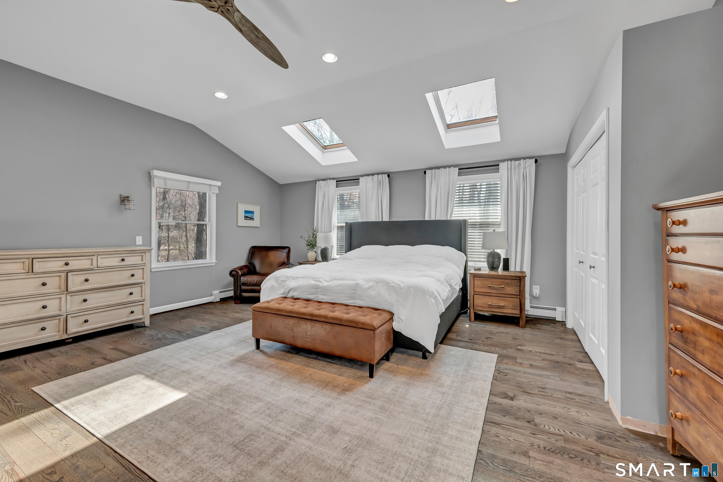 10 Grove Place Bethel, CT 06801 - Photo 15 of 33 a spacious bedroom with a bed and a window