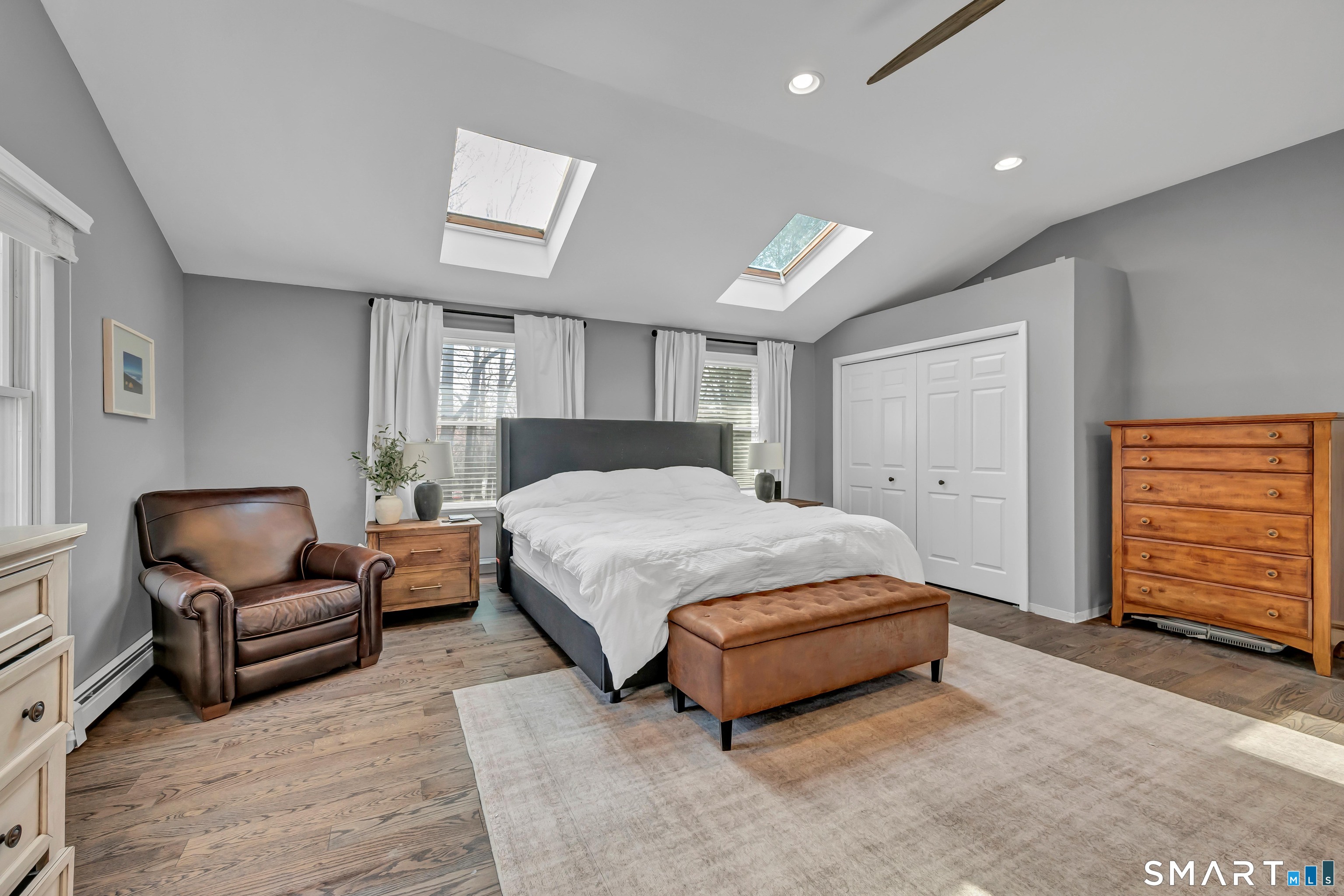 10 Grove Place Bethel, CT 06801 - Photo 16 of 33 a spacious bedroom with a bed and furniture
