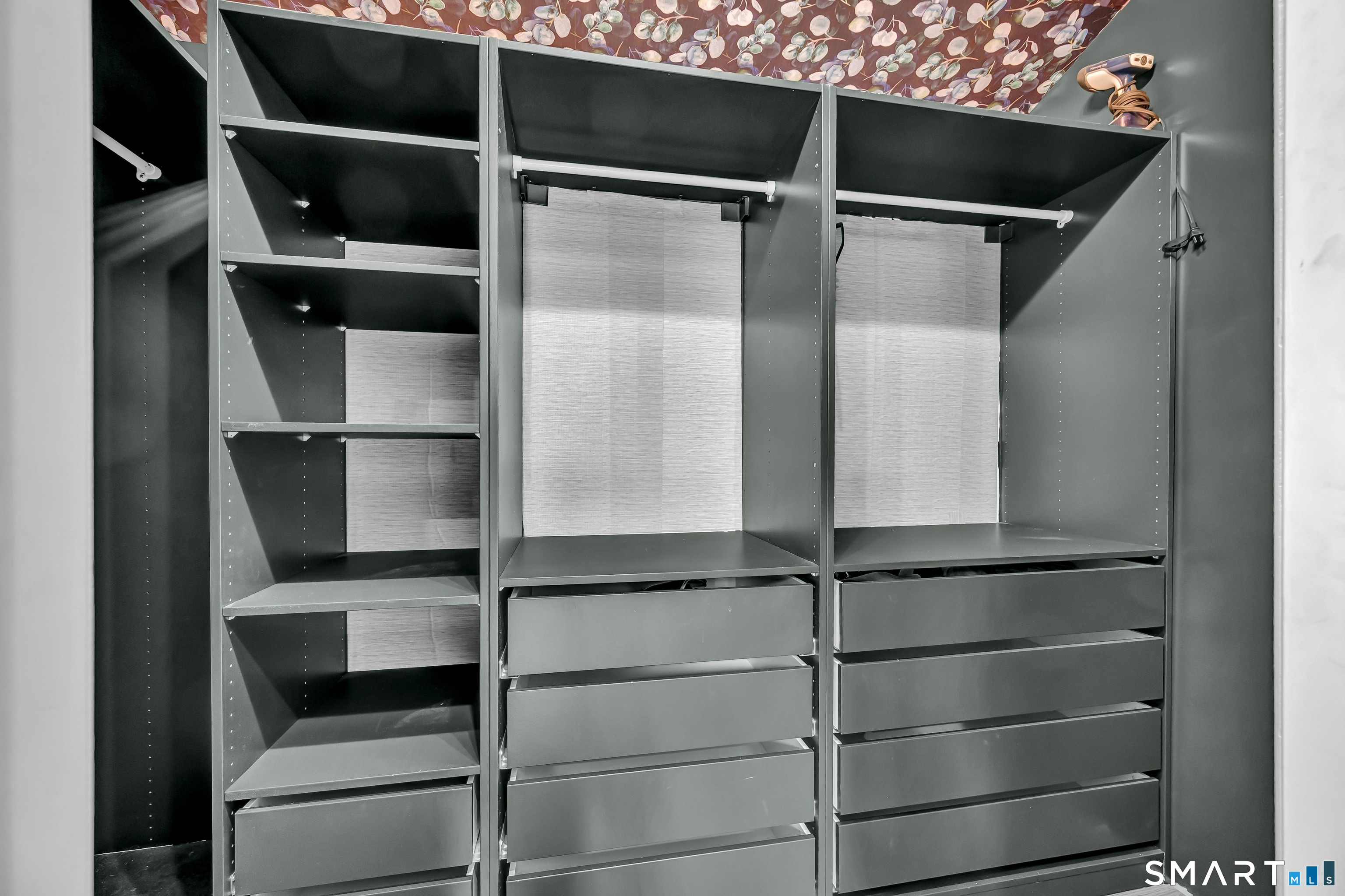 10 Grove Place Bethel, CT 06801 - Photo 17 of 33 a view of walk in closet with empty racks