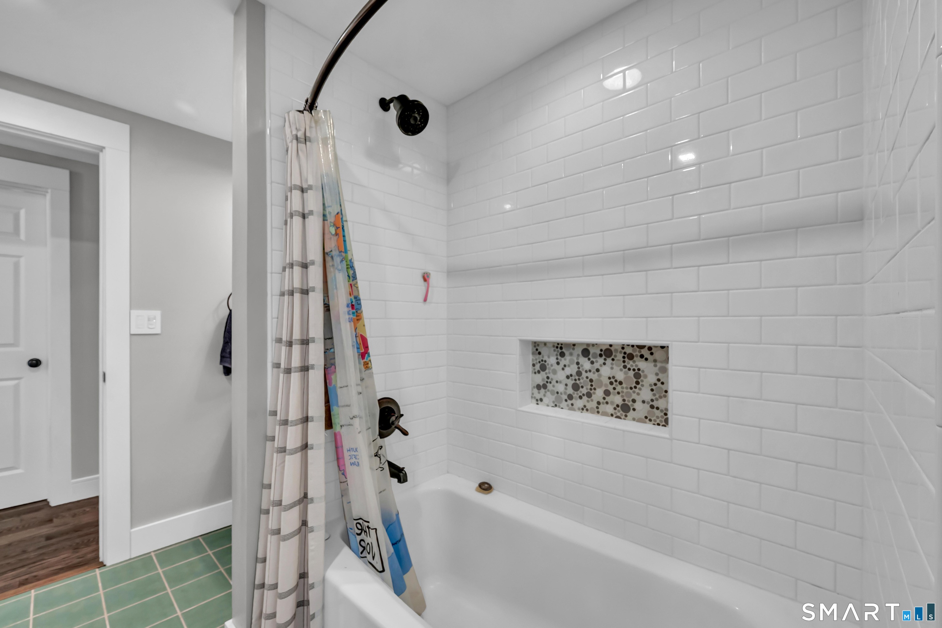 10 Grove Place Bethel, CT 06801 - Photo 20 of 33 a bathroom with a bathtub and shower