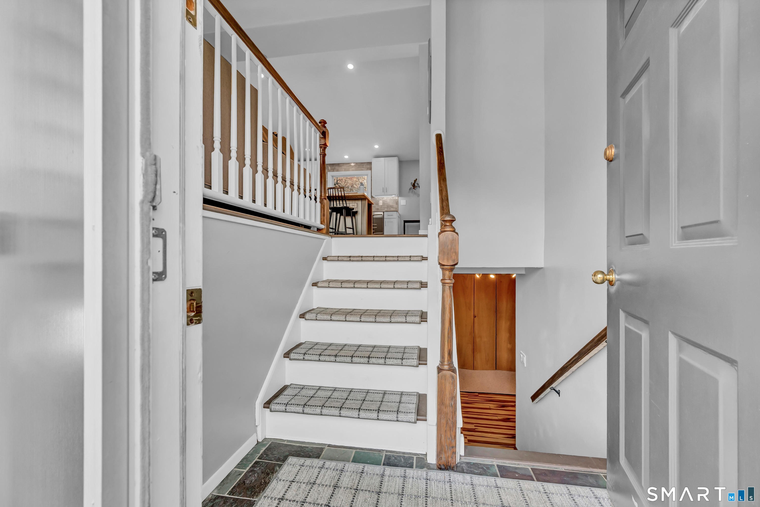 10 Grove Place Bethel, CT 06801 - Photo 25 of 33 a view of entryway with wooden floor and stairs