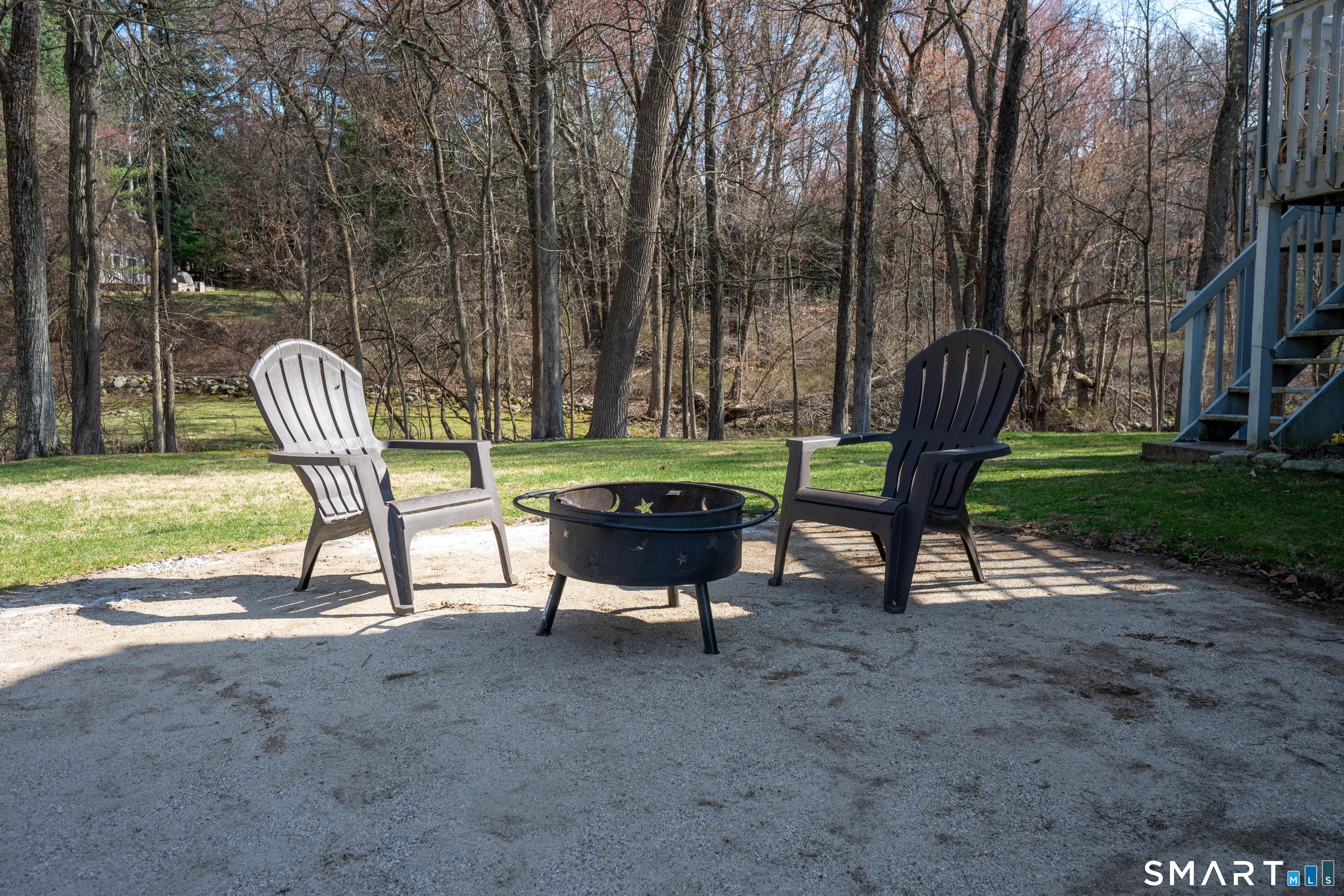 10 Grove Place Bethel, CT 06801 - Photo 30 of 33 a view of a two chairs in a backyard
