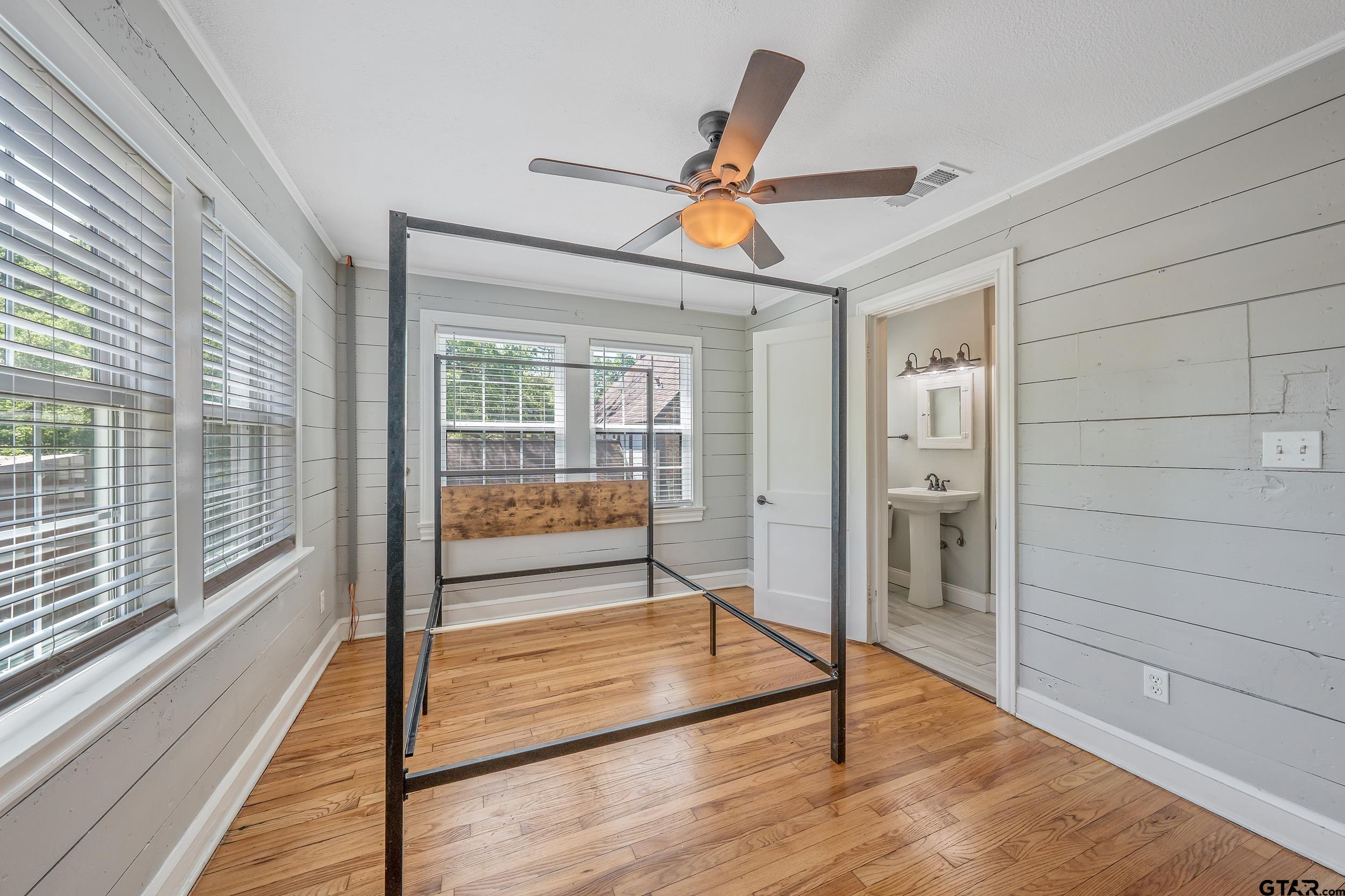 434 South Vine Avenue Tyler, TX 75702 - Photo 19 of 29 a room with a door and windows