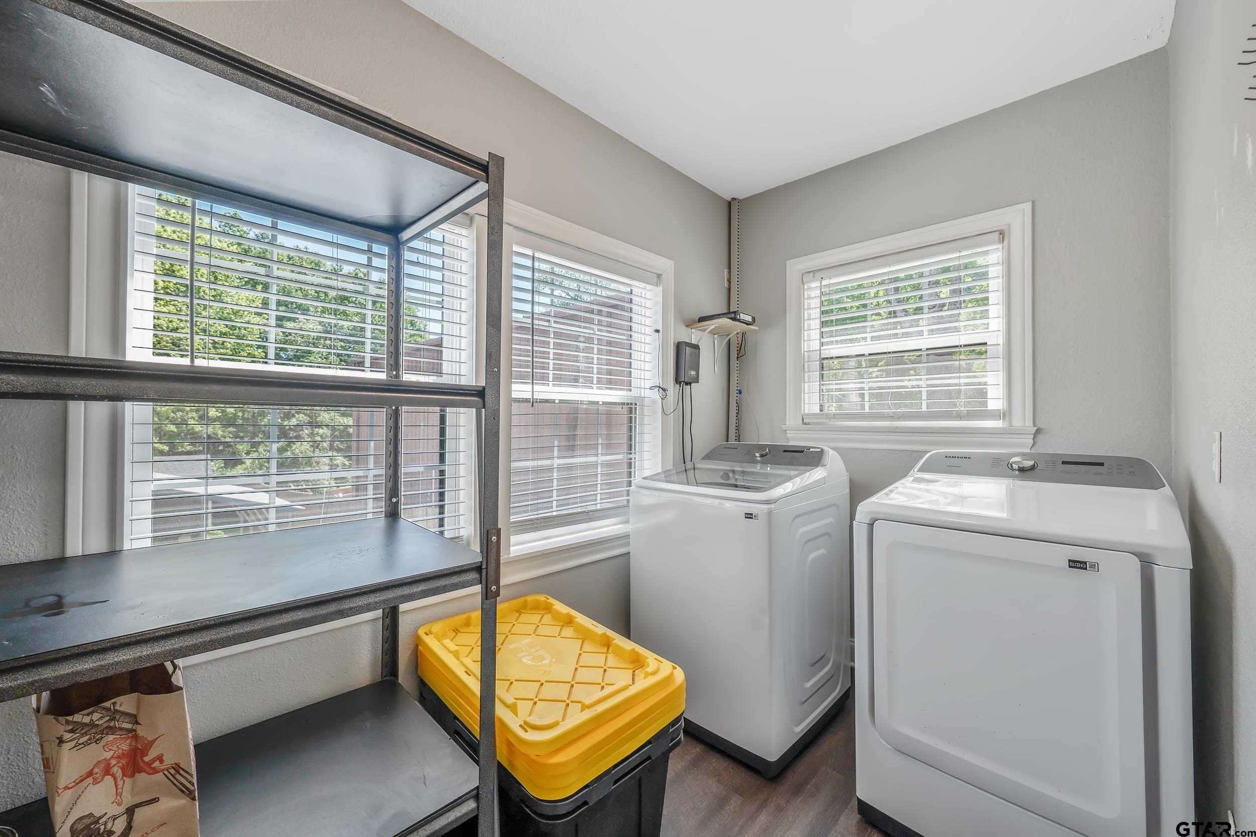 434 South Vine Avenue Tyler, TX 75702 - Photo 23 of 29 a view of a room with gym equipment and a window