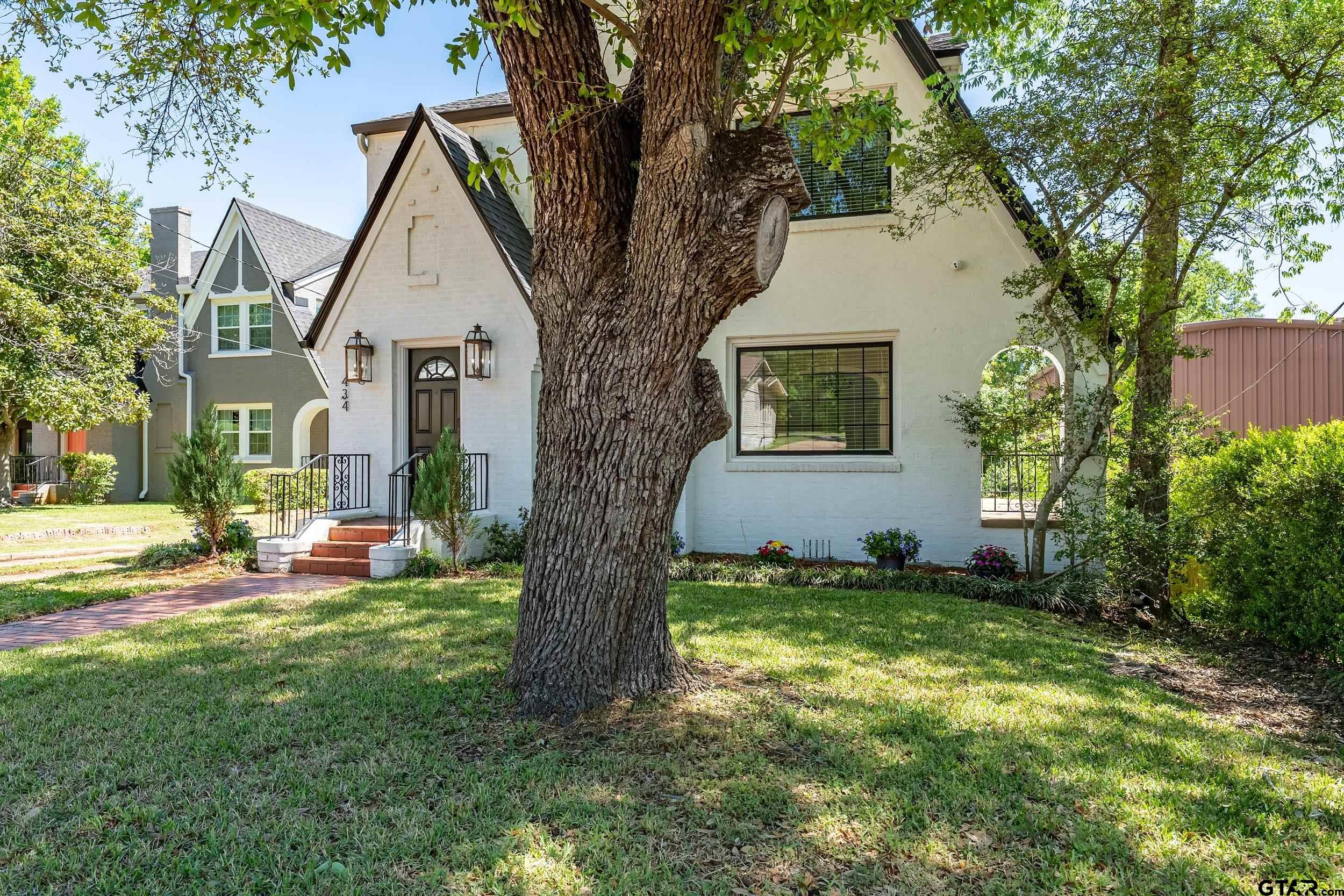 434 South Vine Avenue Tyler, TX 75702 - Photo 24 of 29 a view of a house with a yard