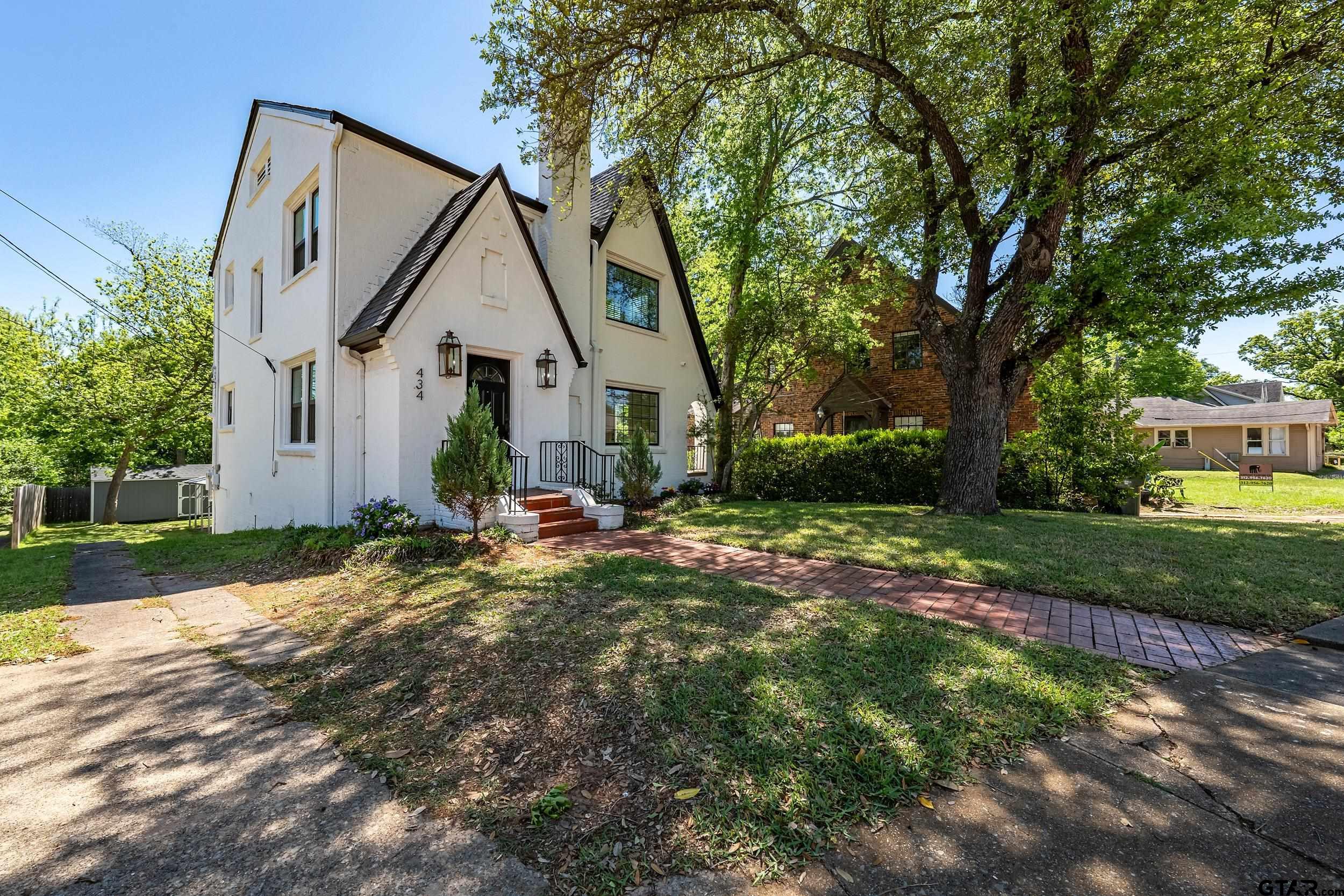 434 South Vine Avenue Tyler, TX 75702 - Photo 25 of 29 a view of backyard of house and trees