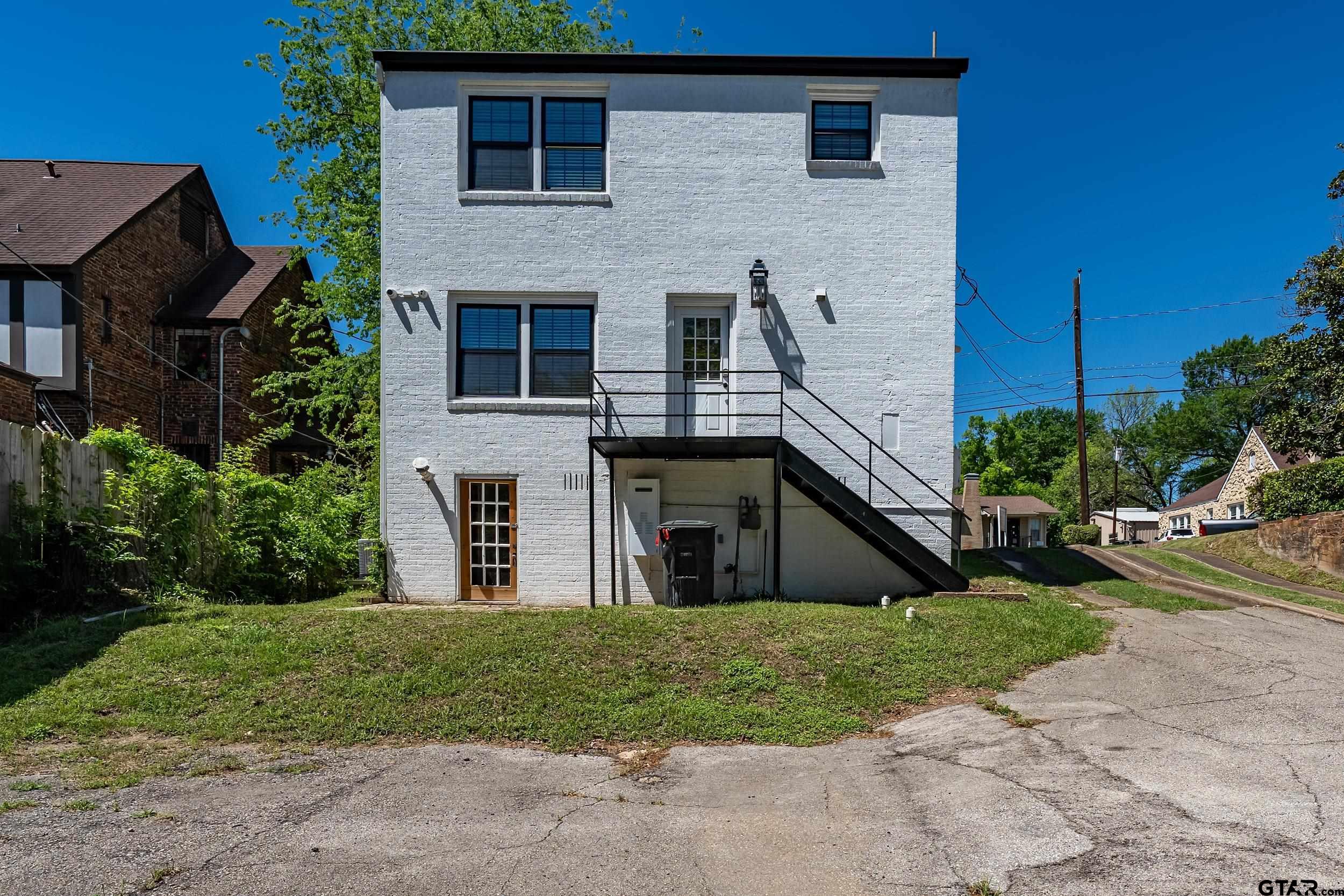 434 South Vine Avenue Tyler, TX 75702 - Photo 29 of 29 a front view of a house with garden