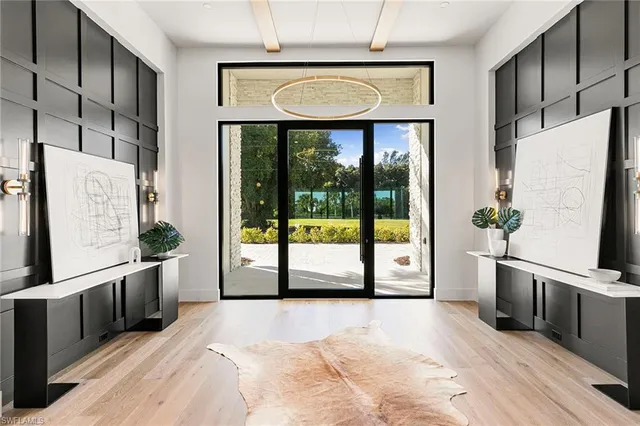 a view of a kitchen with a large window