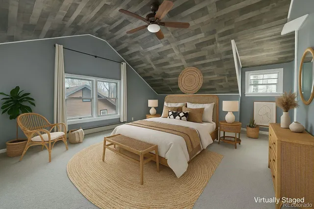 a bed room with a bed and a chair