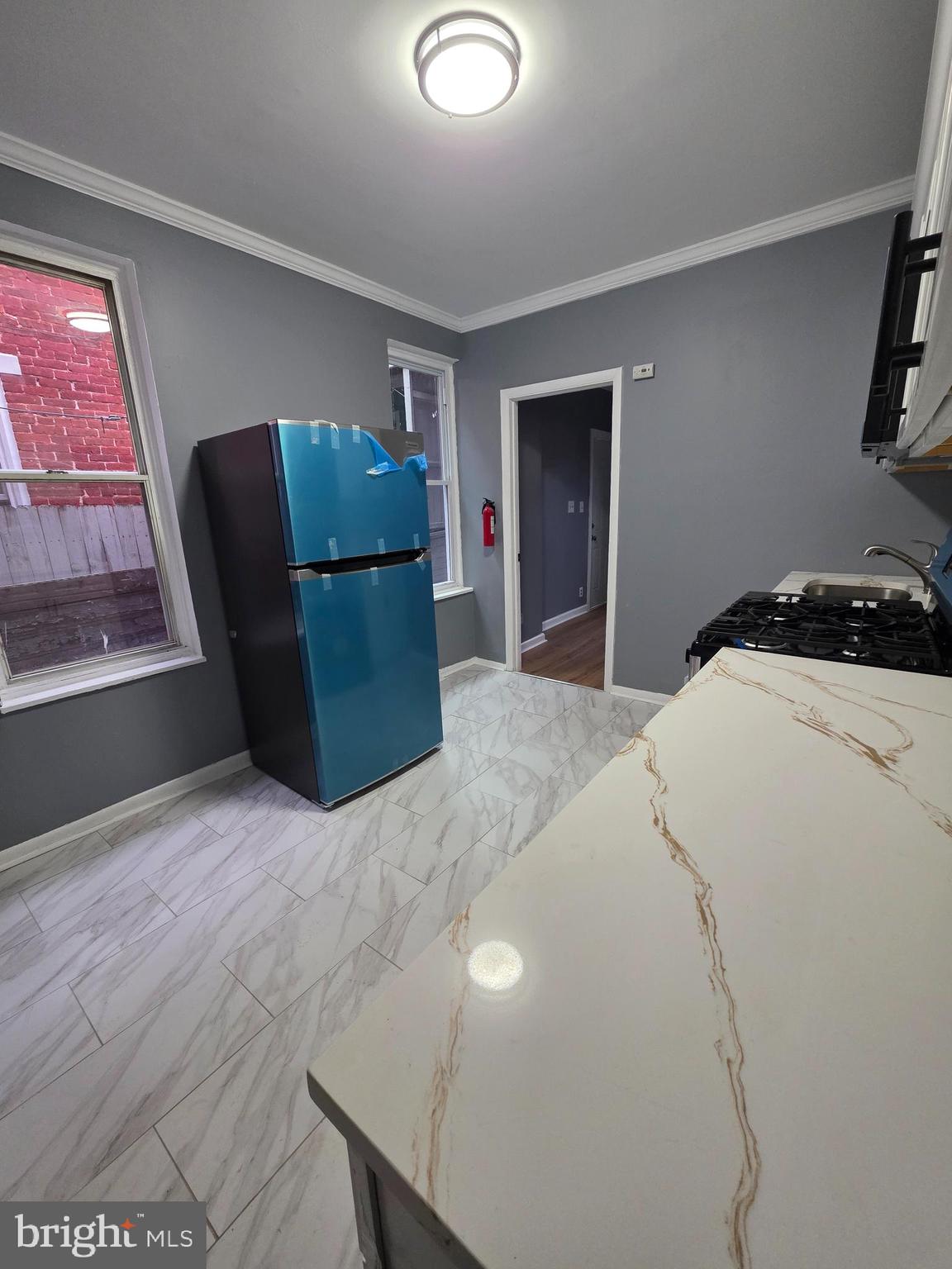 521 Birch Street Reading, PA 19604 - Photo 6 of 16 a bedroom with a bed and furniture