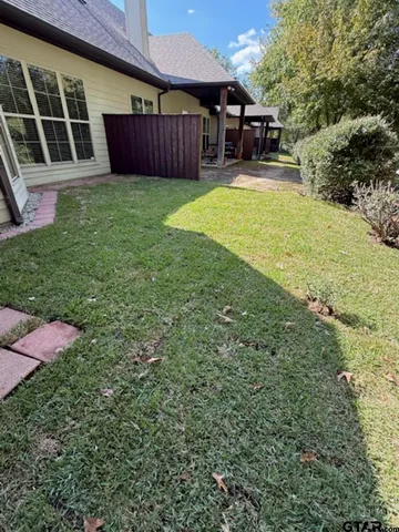 a view of a backyard with a garden