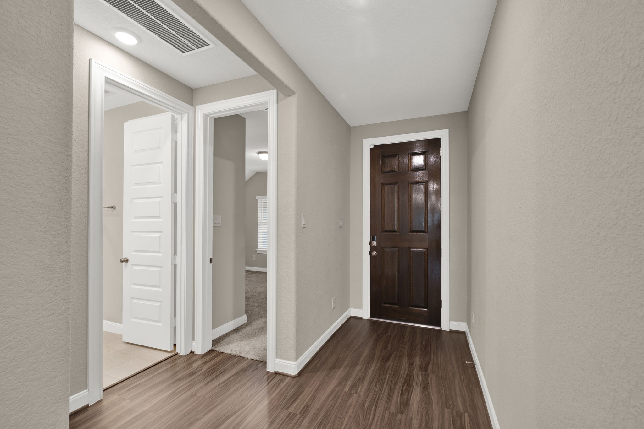 2217 Gadwall Court Conroe, TX 77384 - Photo 19 of 35 wooden floor in a gallery